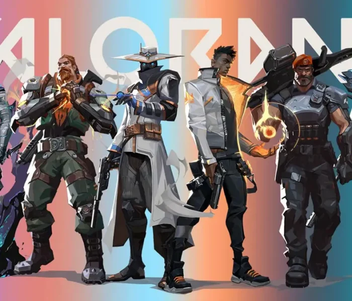 Promotional artwork for Valorant featuring a lineup of six male agents: Omen, Breach, Cypher, Phoenix, Brimstone, and Sova, standing against a colorful gradient background with the Valorant logo.